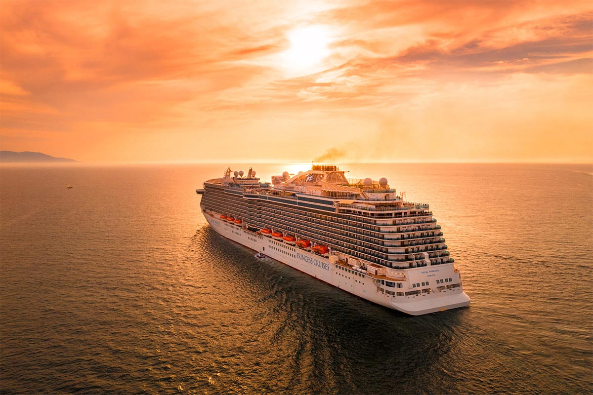 cruise ship at a beauitul sunset
